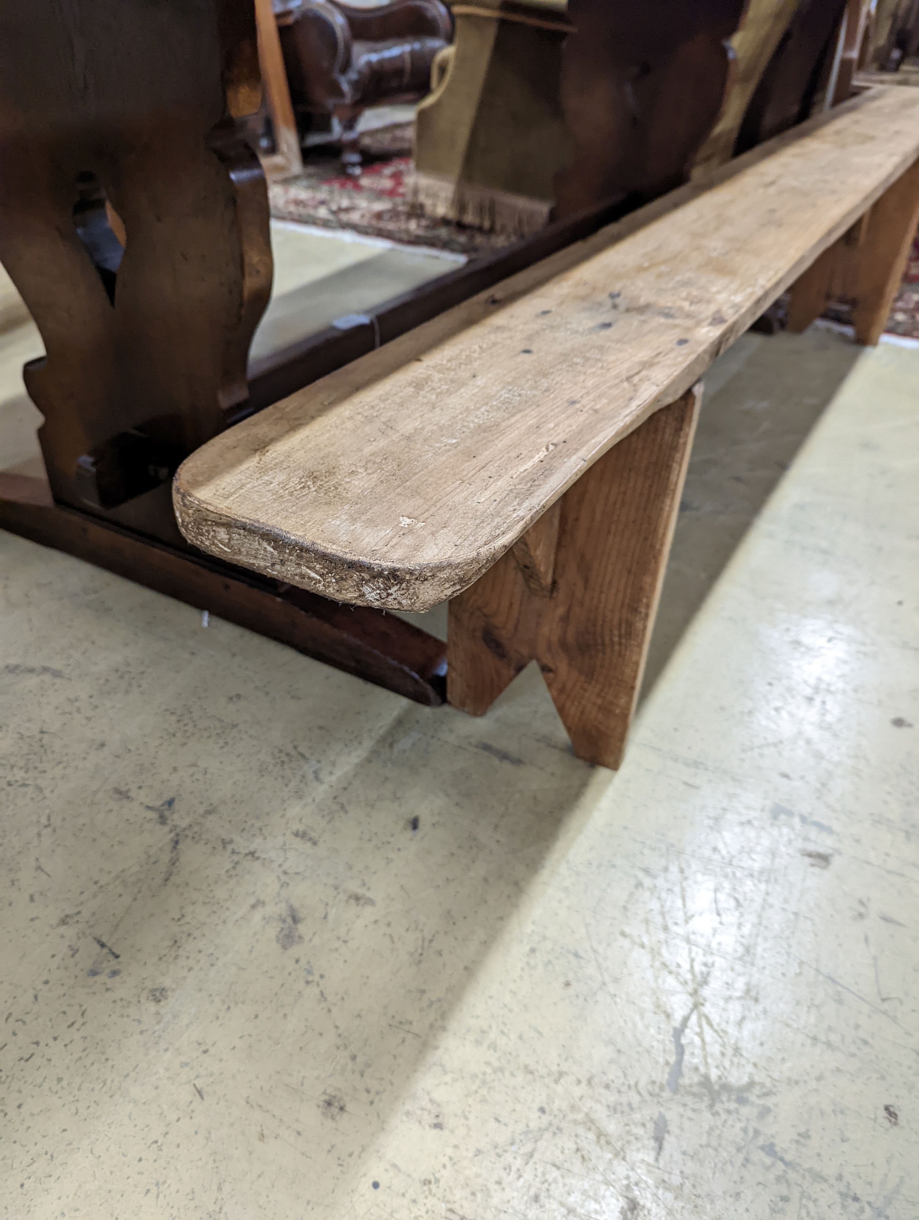 A pair of 19th century pine benches. Length-220cm, Depth-21, Height - 45cm.